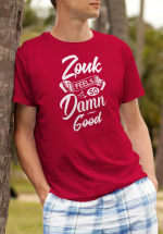 Man wearing Zouk T-shirt decorated with unique “Zouk feels so damn good” design (red crew neck style)