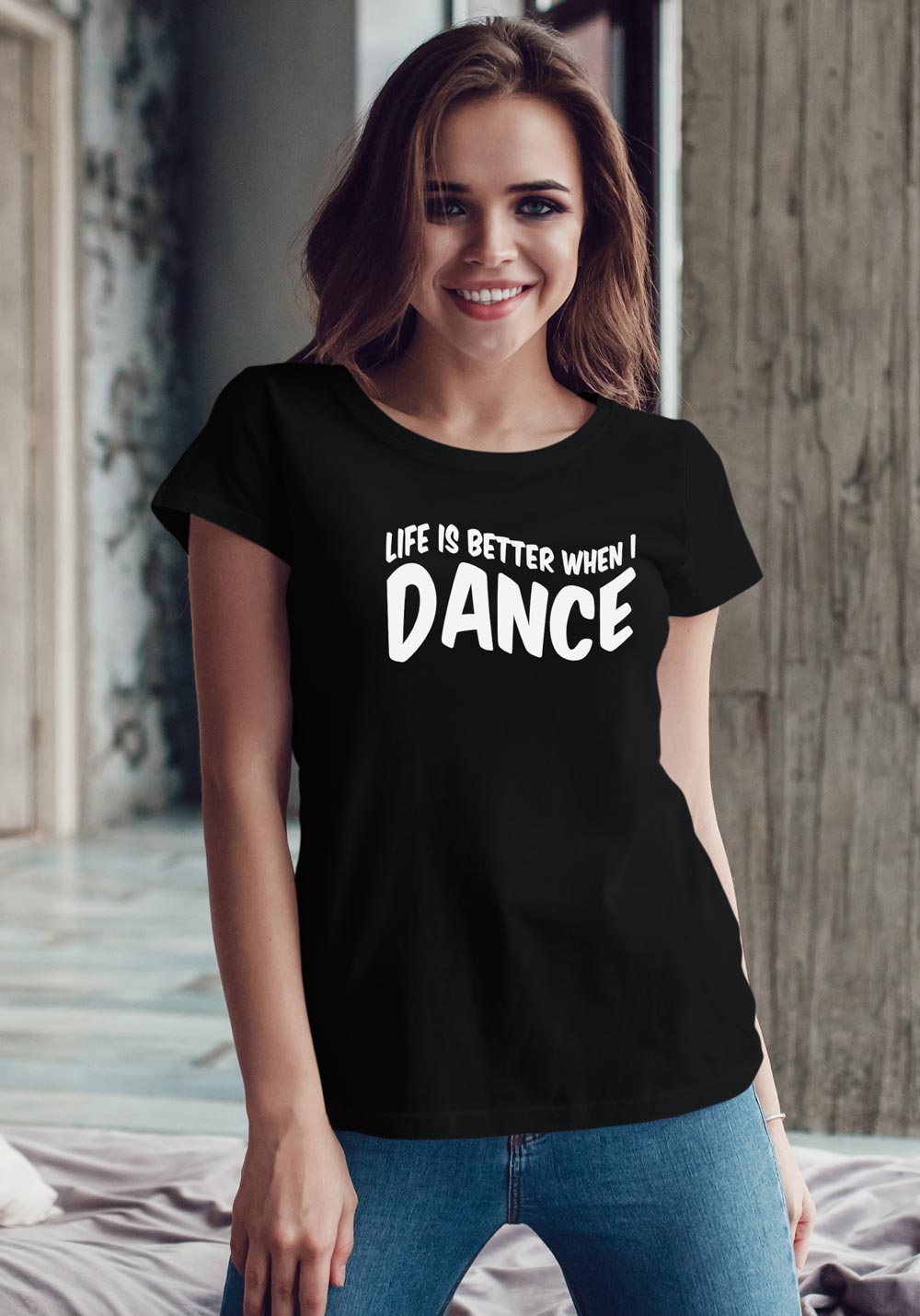 Woman wearing Zouk T-shirt decorated with unique “Life is better when I Dance” design in black crew neck style