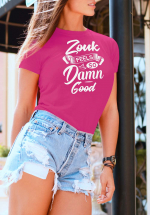 Woman wearing Zouk T-shirt decorated with unique “Zouk feels so damn good” design (pink crew neck style)