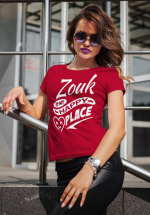 Woman wearing Zouk T-shirt decorated with unique “Zouk is my happy place” design (red crew neck style)